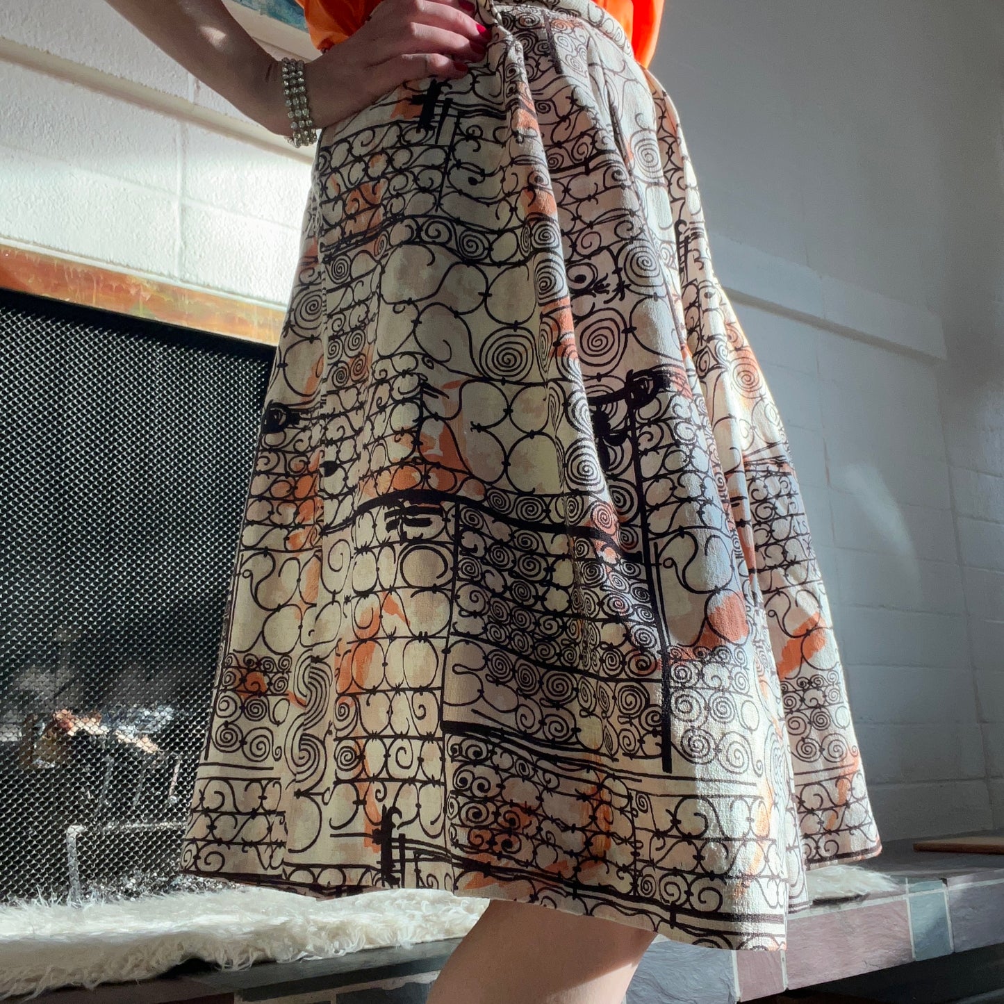 Skirt on person against fireplace background