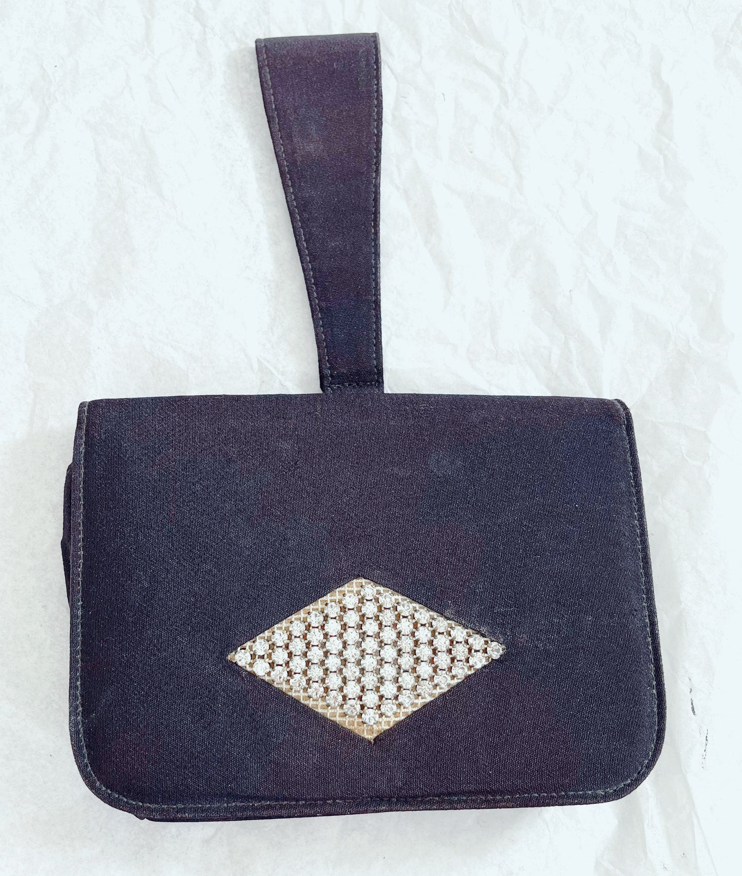 Image of bag laid flat against white background.
