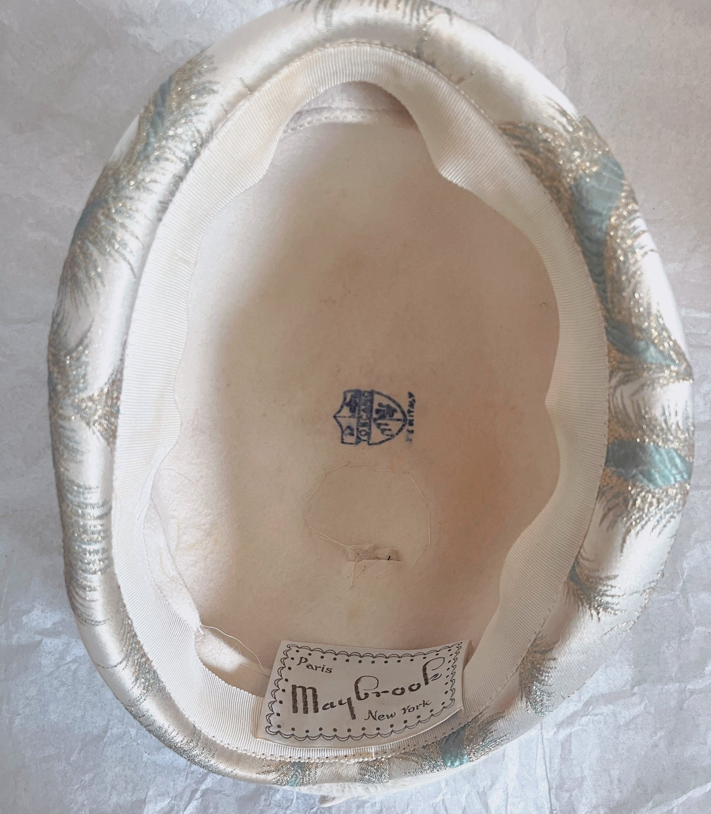 View of inside of hat showing Maybrook tag and stamping.