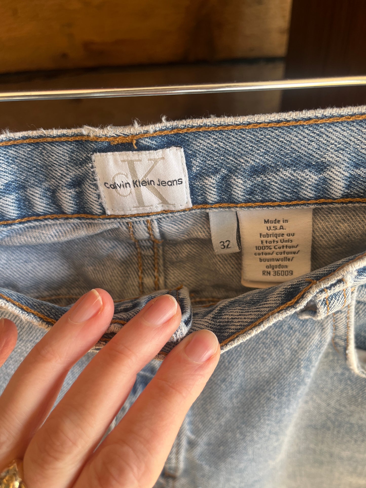vintage 90’s Calvin Klein mid-wash jeans, med/31”
