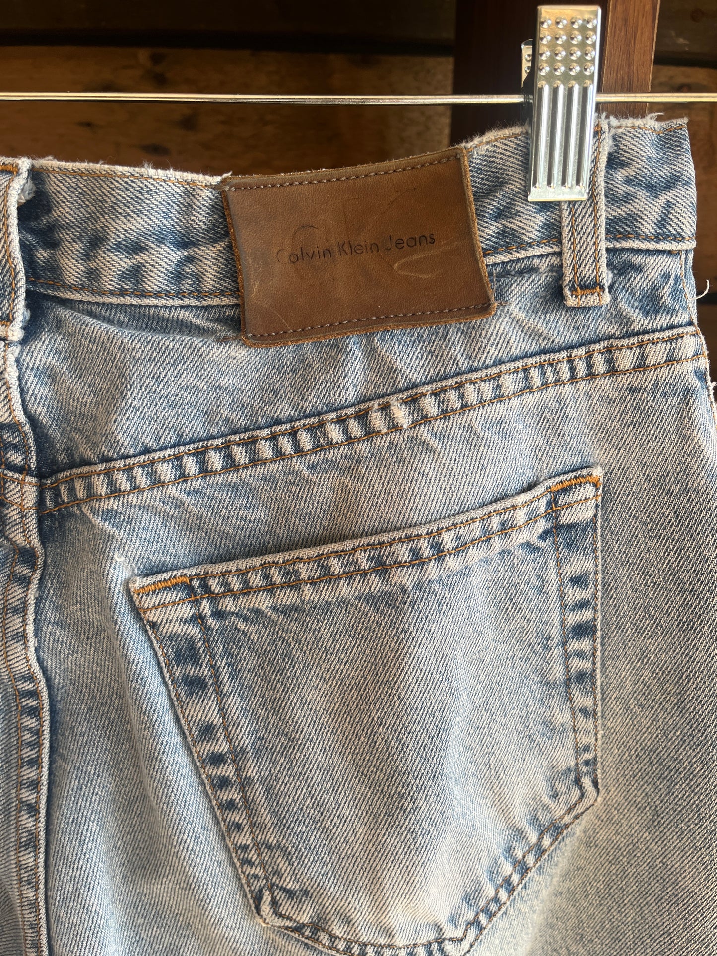 vintage 90’s Calvin Klein mid-wash jeans, med/31”